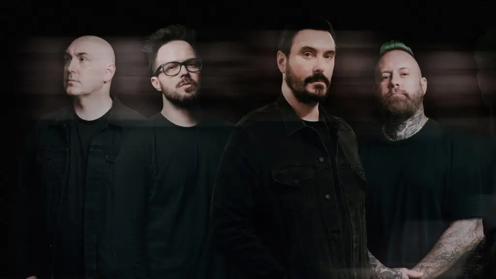 Breaking Benjamin band promotional photo, four members in dramatic dark lighting