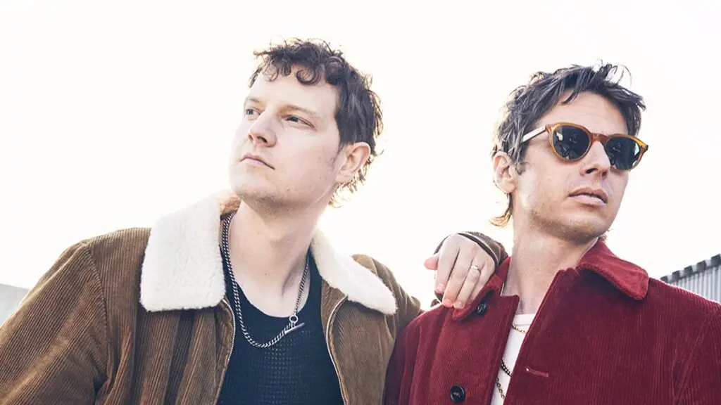 Foster the People band members in a promotional press photo for the Good Mourning Sunshine Tour 2026