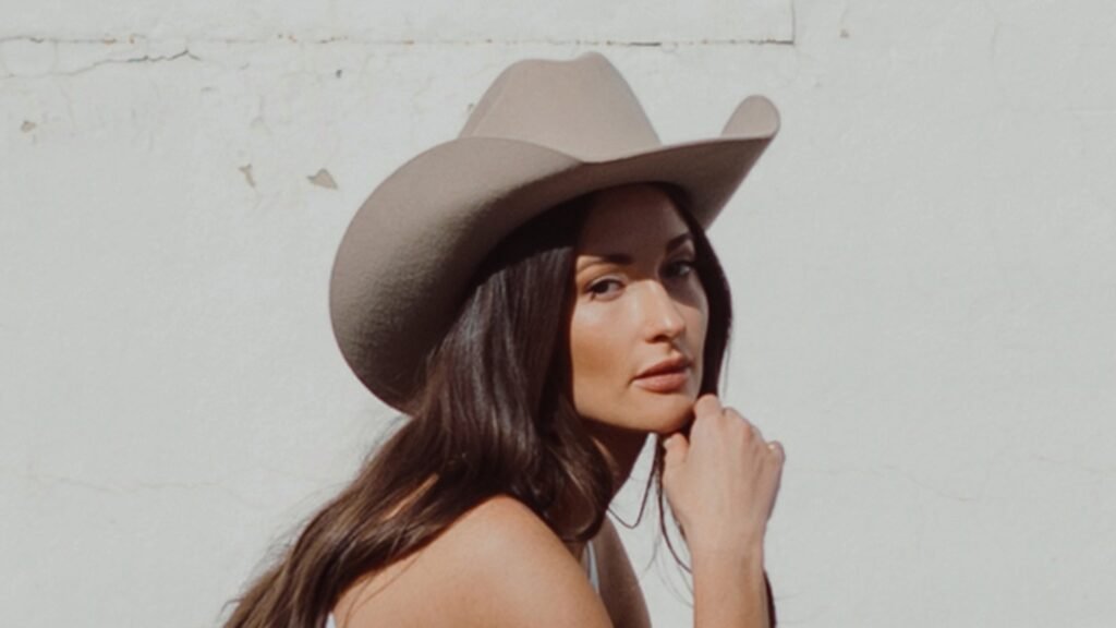 Kacey Musgraves in cowboy hat, press photo for the Middle of Nowhere Tour