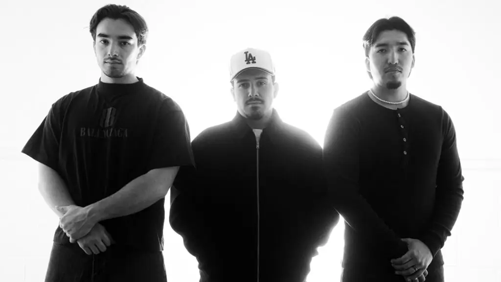 Eslabon Armado members in black-and-white promotional press photo for Amor Nocturno Tour
