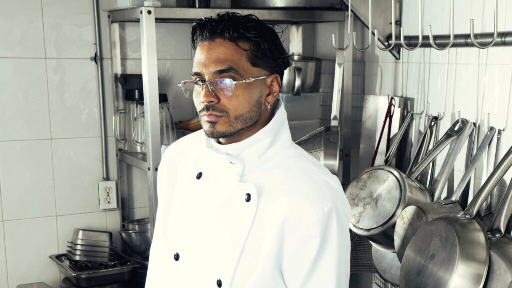 Álvaro Díaz in chef's coat in a professional kitchen, OMAKASE tour promotional photo