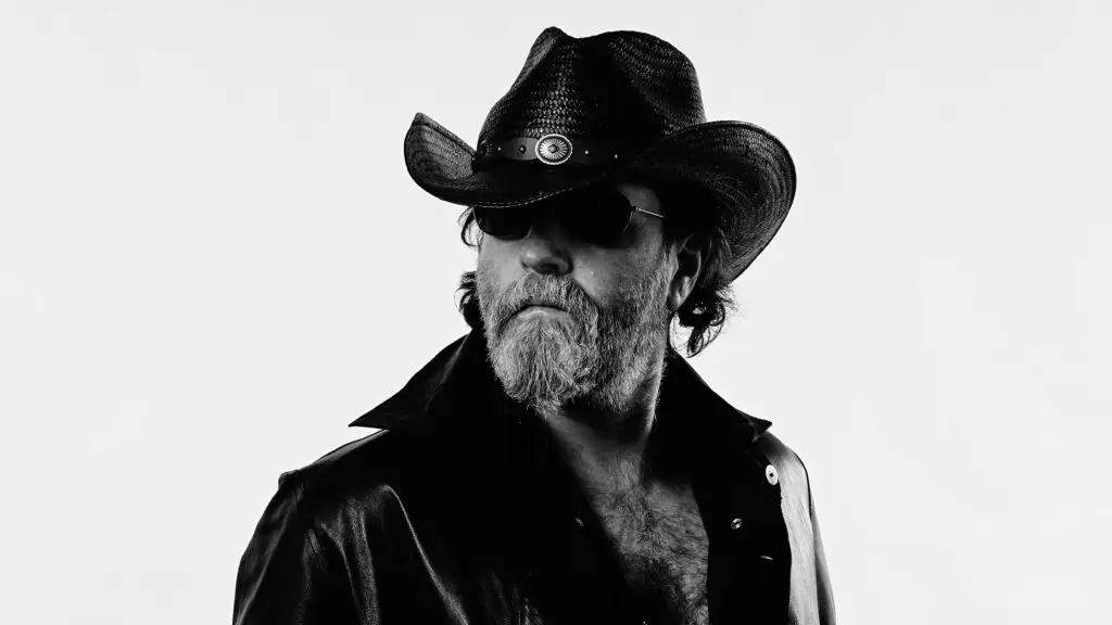 Wheeler Walker Jr. in cowboy hat and leather jacket, official promotional photo for Pullin' Out Farewell Tour