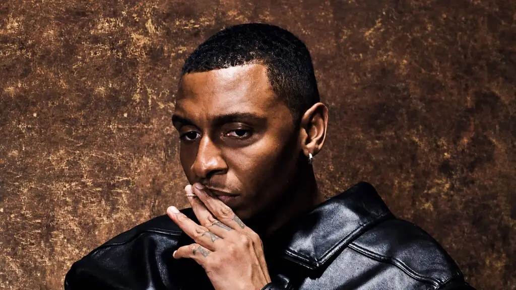 Masego in official press photo, black leather jacket, Fix Your Face Tour 2026