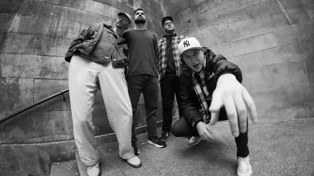 State Champs four-piece band promo photo, urban staircase backdrop, pop-punk