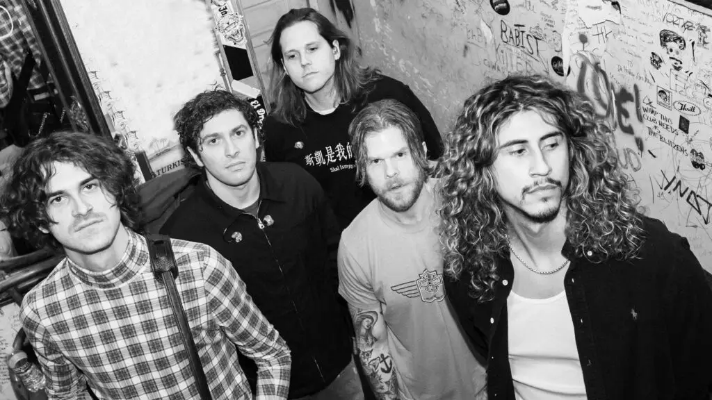 Culture Wars performing live — five-piece Austin alt-rock band press photo