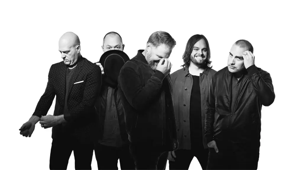 MercyMe five-piece band in black and white studio press photo